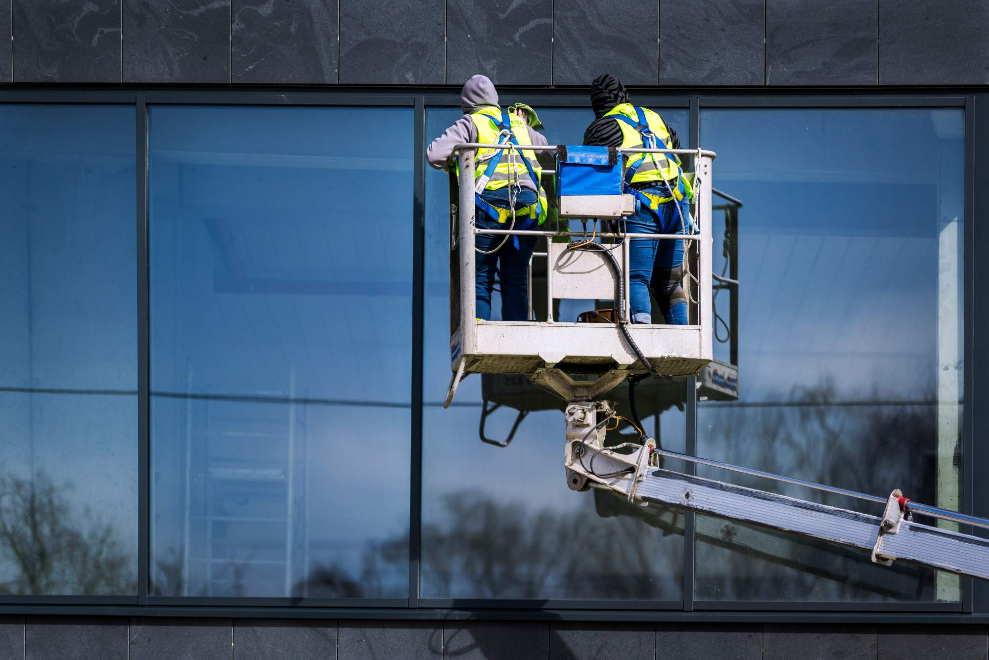 Boom lift window cleaning
