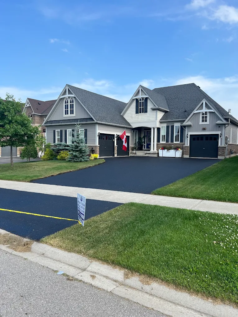 Freshly sealed driveway by ProSeal Property Services