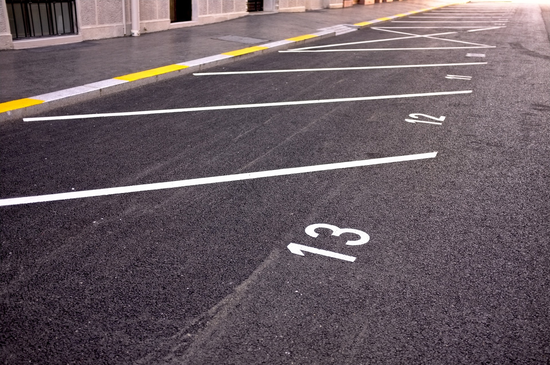 Parking lot line painting and pavement markings